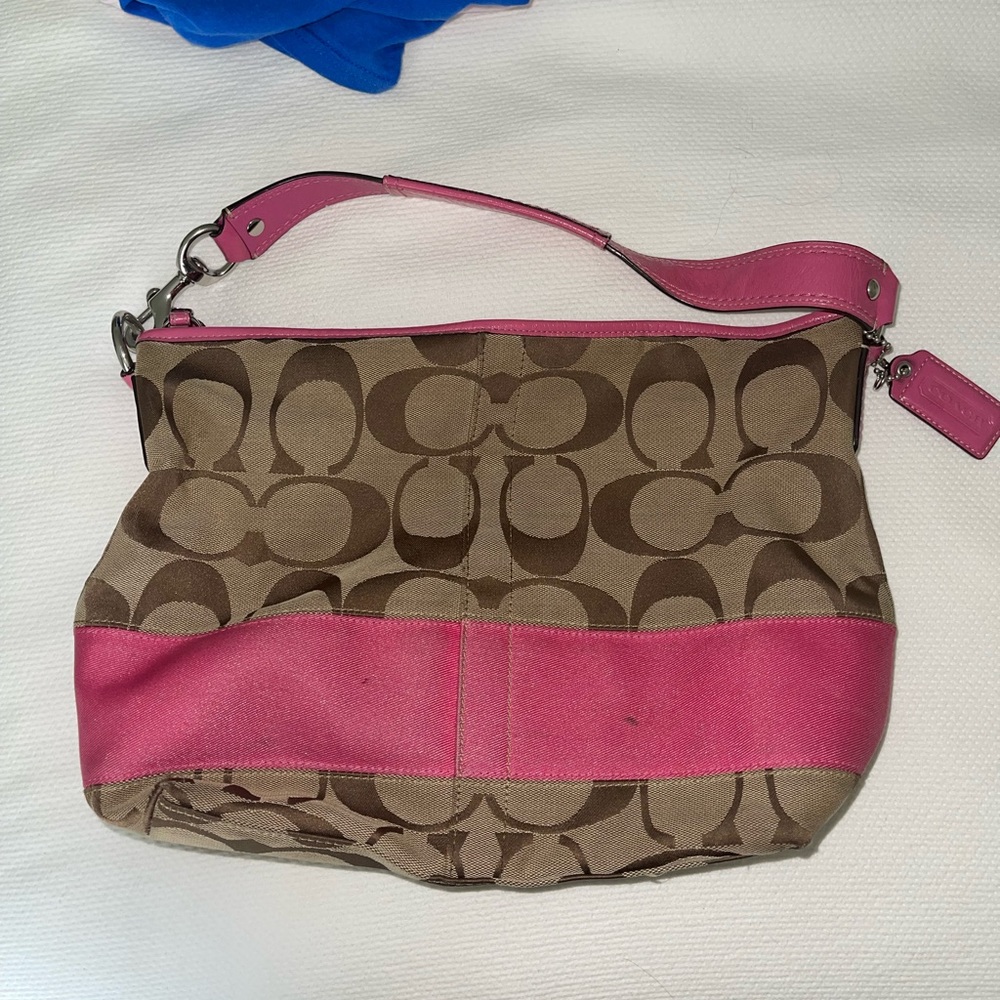 Authentic pink coach shoulder bag. Some spots untreated.